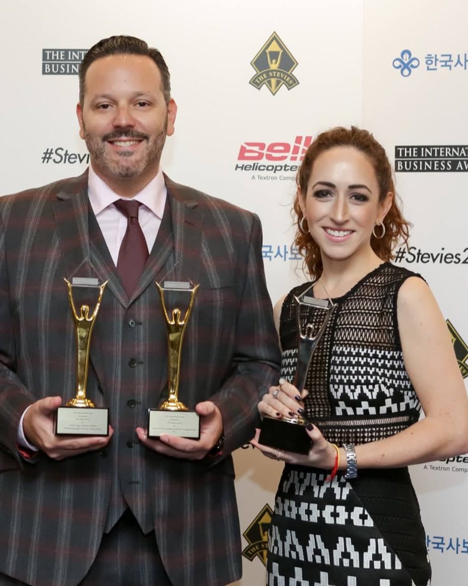 Doron Fetman and Toby Hassan-Fishman with Stevie Awards at The International Business Awards.